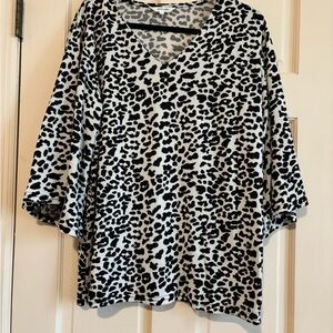 Amaryllis Black and White Leopard Print Sweater with bell sleeves.